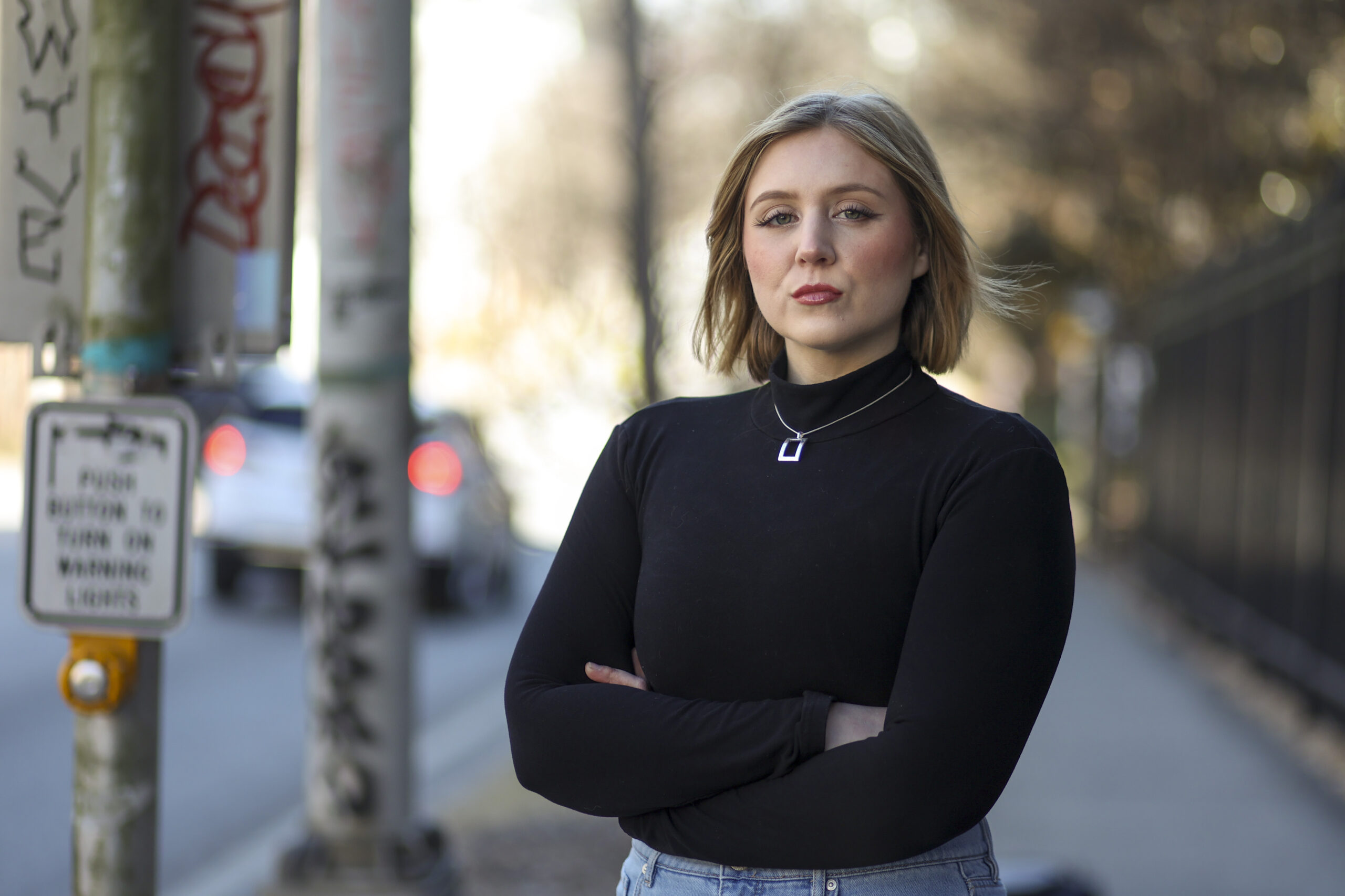 Veronica Watts poses for a portrait near the crosswalk of North Avenue in Midtown.
